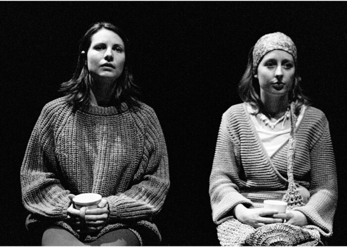 Lou & Liz Magic 2003 Two women sit in silence next to each other